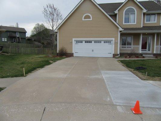 Caulked driveway and repaired concrete