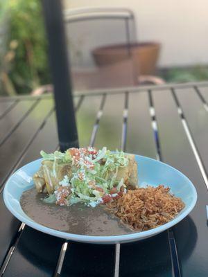 Shredded beef chimichanga with rice and beans