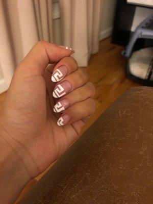 I showed Amy a picture of the nails that I wanted and she painted it perfectly... on her first try too!!