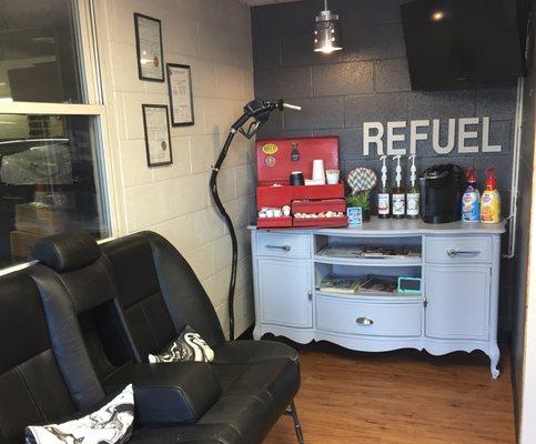 "Refuel" in our comfy waiting room. Keurig with flavored syrup while you chill on the BMW bench?