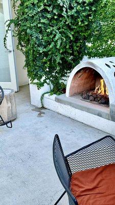 Patio room with fireplace is the best way to go here at The Ace Palm Springs.