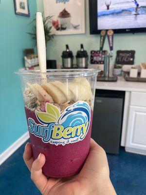 Bikini Bowl, no honey (organic pitaya blended w/ banana, strawberries, kiwi, coconut water - topped w/ granola, coconut, banana)