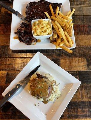 Bacon wrapped filet with garlic mashed potatoes. Half rack ribs, burnt ends, mac n cheese and fries