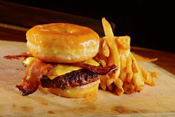 Luther: American cheese and crispy honey peppered bacon, served between two toasted glazed donuts.