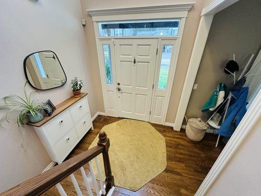 Basket, thoughtful coat rack, and custom shoe cabinet made our foyer functional for kids!