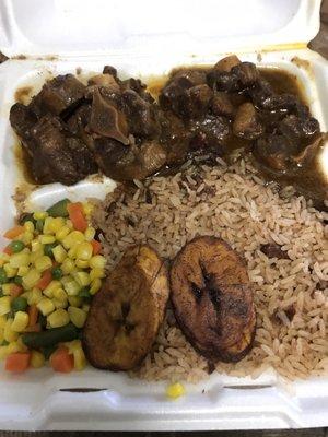 Oxtail large combo with mixed vegetables , rice & beans, & plaintains.