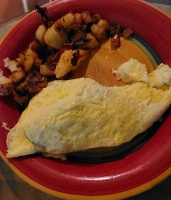 Spinach, cheese and tomato omelet with home fries