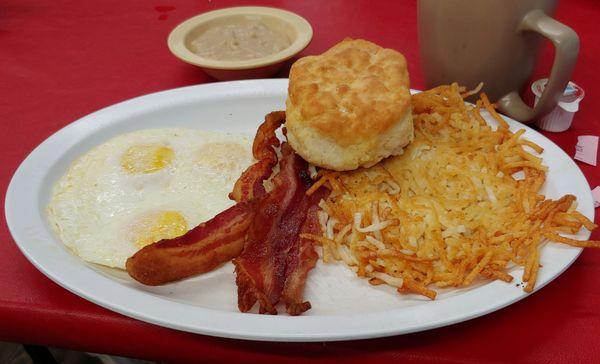 3 eggs hashbrowns bacon biscuit brown gravy