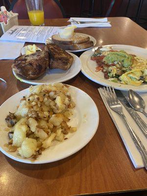 Omelet,  fried potatoes, cranberry nut muffin. Fresh squeezed orange juice