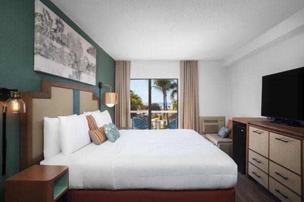 The Jimmy B's Room features one king bed and a private balcony, facing our famous restaurant bar, Jimmy B's.