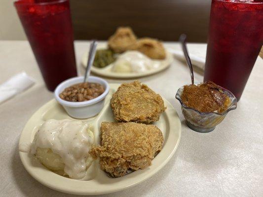 Fried chicken, mashed potatoes, gravy, pinto beans, peach cobbler - all from the steam table selection