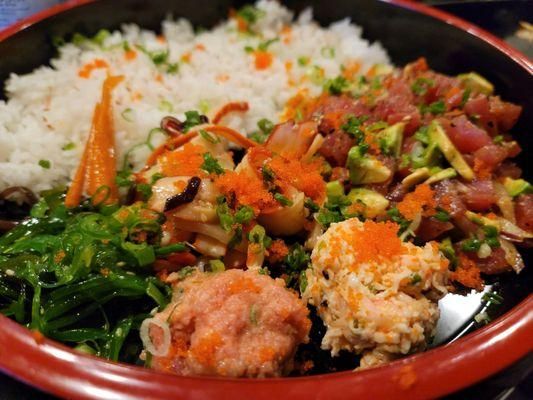 Poke bowl.  This has a calamari salad, seafood salad, crab salad along with the poke and rice.  It's a very generous portion and delicious!