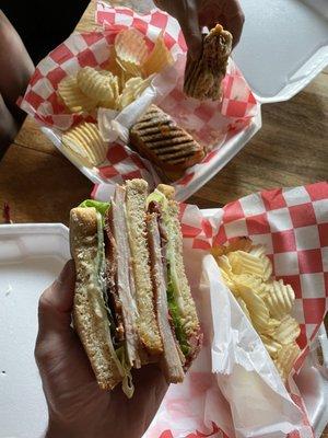 The turkey club and Rachael sandwich