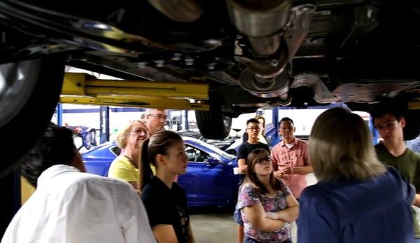 Sarah explains "how to spot under the car trouble" at SMARTeen Driver auto safety and car care clinic -at Findlay Acura