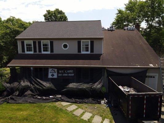 Mid way through our roof installation! Our Catch-All Landscape Protection System shows We Care!