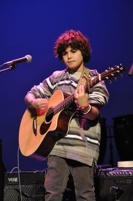 Guitar student in the Showcase.