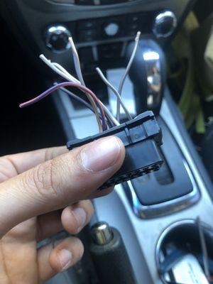 OBD-II connector that I cut from a car of my exact make and model. Marvin recommended the place and let me borrow his wire cutters!