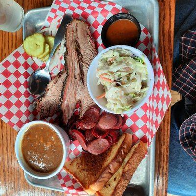 Two meat platter, brisket, hot links, slaw and beans.