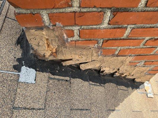 Deteriorated flashing around the chimney - allowing moisture into the home.