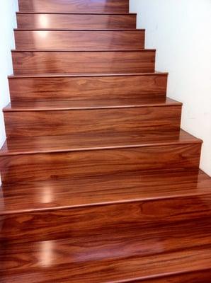 Newly remodeled stairs using our glossy laminate, Red Stream!