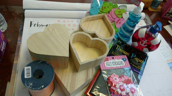 heart shaped jewelry boxes to decorate. The tissue paper is for making decorative pom poms