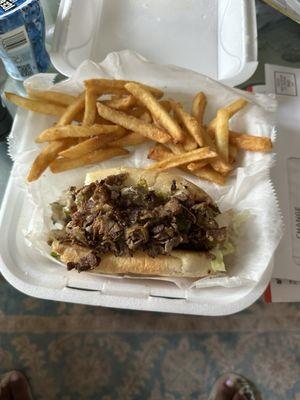 Philly cheesesteak and fries...after I already took a few bites...so delicious!!!!