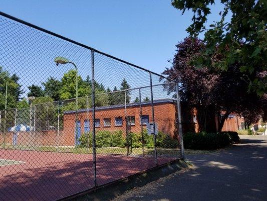 Pool is behind tennis courts...enter through front of brick building.