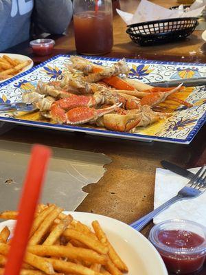 What my cousins son and husband shared . A plate of crab legs $54.