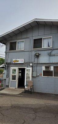 The restaurant entrance.  There is an adjacent parking lot.