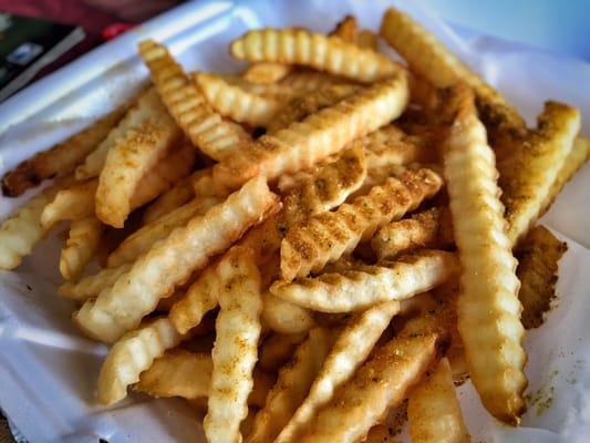 Relatively bland waffle fries despite dusting of seasoning. Perhaps dirty grease? Had an odd flavor/smell to them