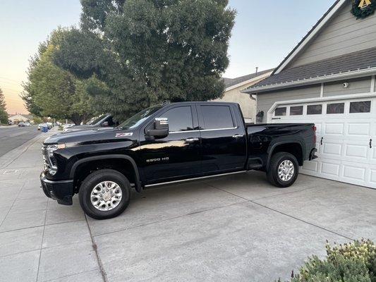 Glossy Wrapped Front and Rear Bumper. Front window Ceramic Tint 35%, rear windows have 20% factory + 20% ceramic tint.