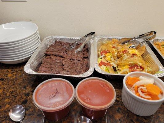 Marinated carne asada steak, hard shell chicken and shredded beef tacos, pickled carrots and mild and spicy salsa