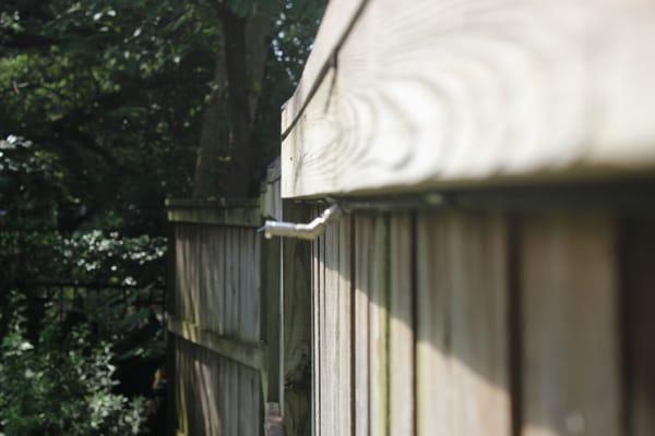 MistAway Mosquito System nozzles are installed around the perimeter of the yard