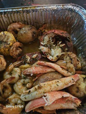 Seafood platter (Shrimp, potatoes, corn, snow crab cluster meat (was 2 clusters), lobster tail (they cut in half), corn ,& sausage