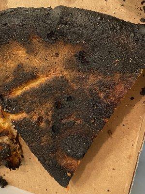 Burned pizza.