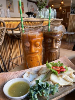 Muk Ka Dong Yang (grilled cuttlefish) up front. Thai Iced Tea with Milk and Thai Iced Coffee with Milk in the back.