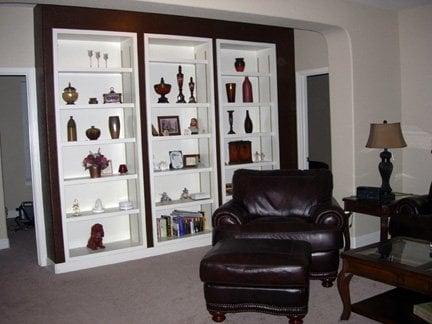 A living room with accent; walls and trim painted.