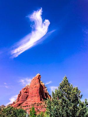 Angel cloud passing over