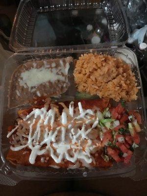 Ground beef enchiladas with rice and beans