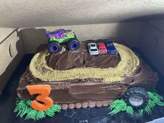 Monster truck themed birthday cake