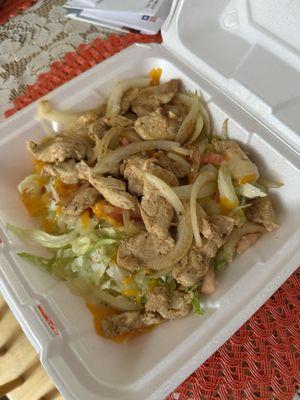 Chicken fajita salad. Doesn't come with sour cream, pico, guac or the shell  the worst!