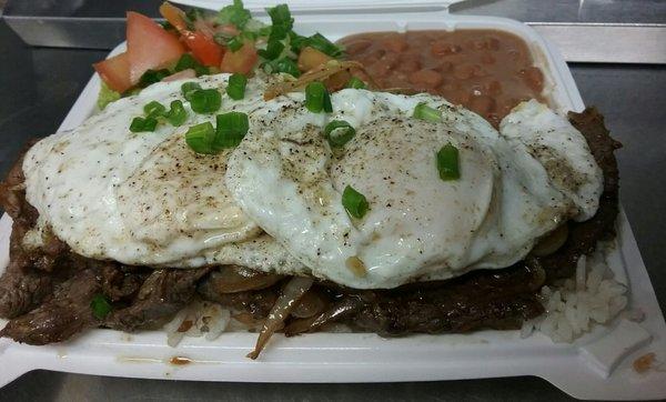 Grilled steak and eggs.