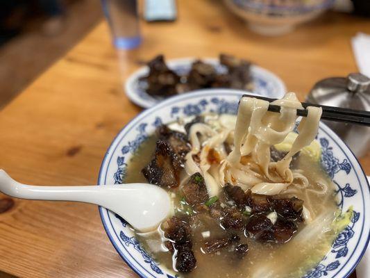 Beef tendon soup noodles with some chili oil