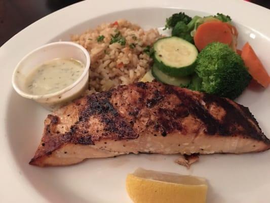 Delicious Grilled Salmon with creamy dill sauce on the side. Tonight's Special- Grilled to perfection, moist and buttery inside.