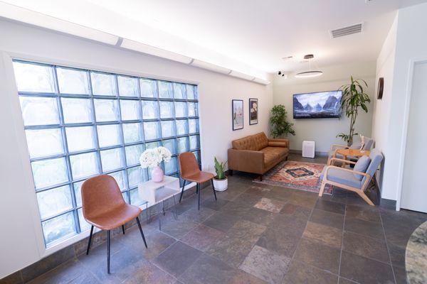 Comfortable, modern, clean, spacious reception area for you to relax before your appointment!