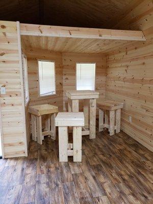 Dining area inside rustic cabin