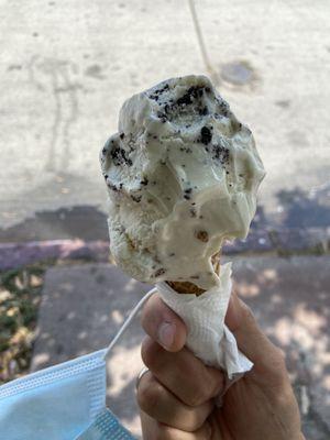 Cookie and malted vanilla with brown bread on a sugar cone