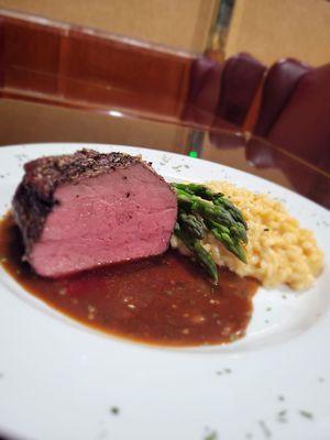 Chateaubriand with a tarragon, white wine pan sauce served with a lobster risotto and grilled asparagus.