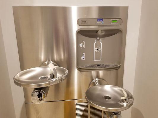 Water fountain and bottle filling station near restrooms