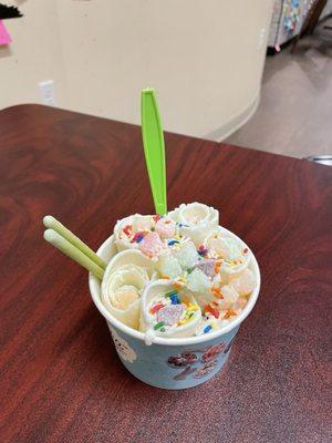 Almond almond base with coconut mixed in, mochi, rainbow sprinkles, matcha pocky